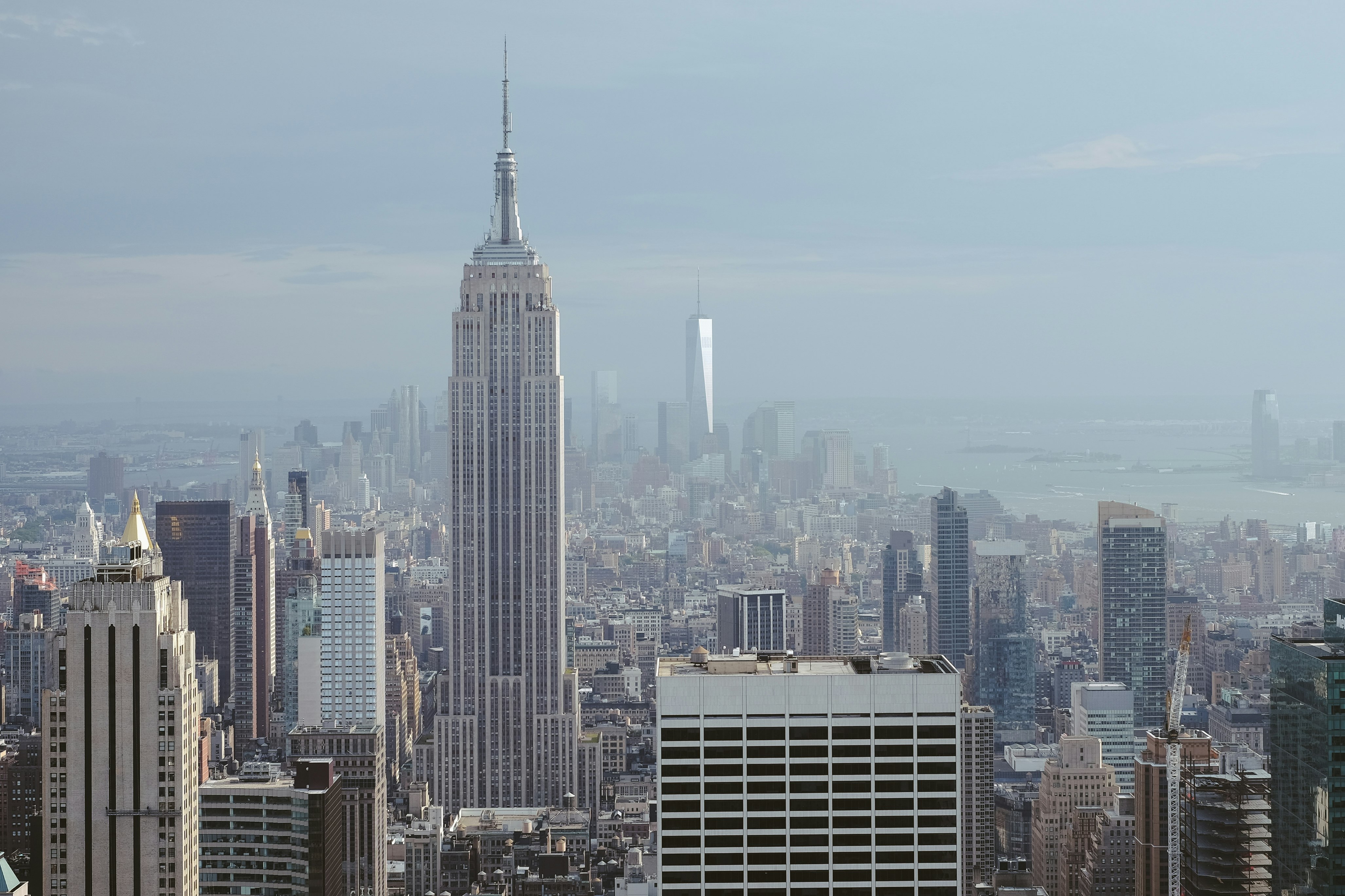 gray high rise building near freedom tower at daytime